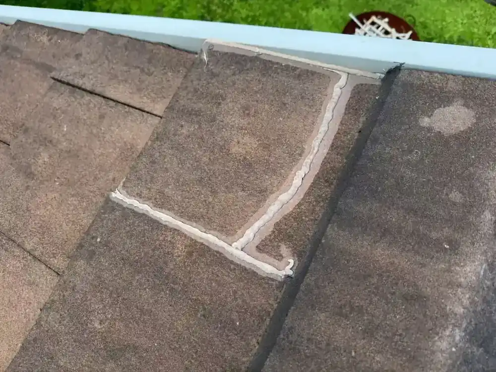 Close photograph of a local tile repair detail